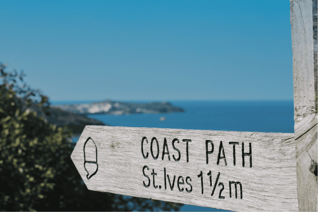 View of a sign saying Coast Path St.Ives, a view on an anniversary wildlife tour